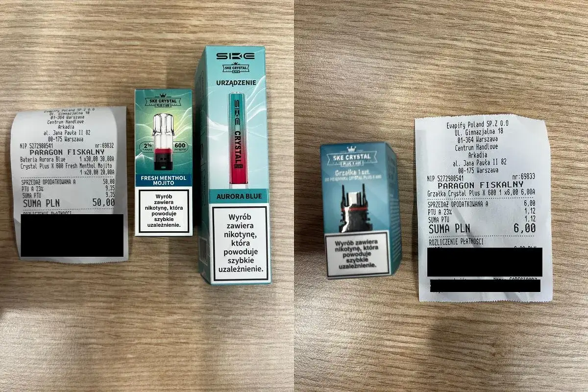 Paragon fiskalny i opakowania e-papierosów SKE Crystal. Akcyza na e papierosy widoczna na rachunku.